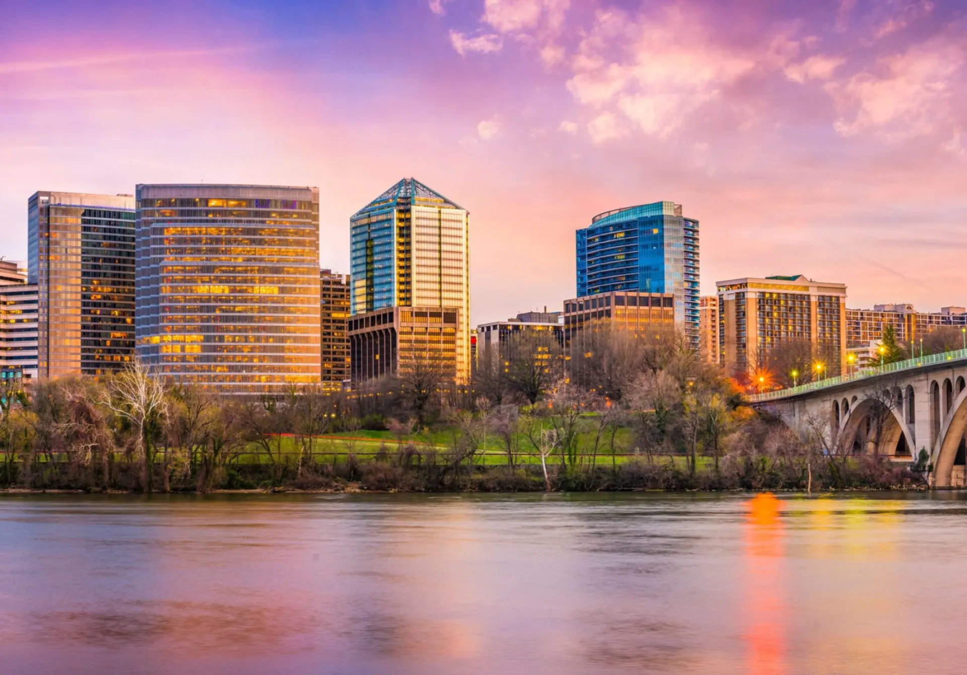 City skyline with river at sunset